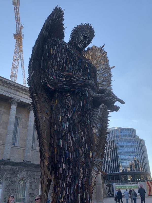 a statue of a man made of knives