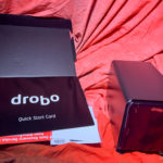 a black box with a black box on a red surface