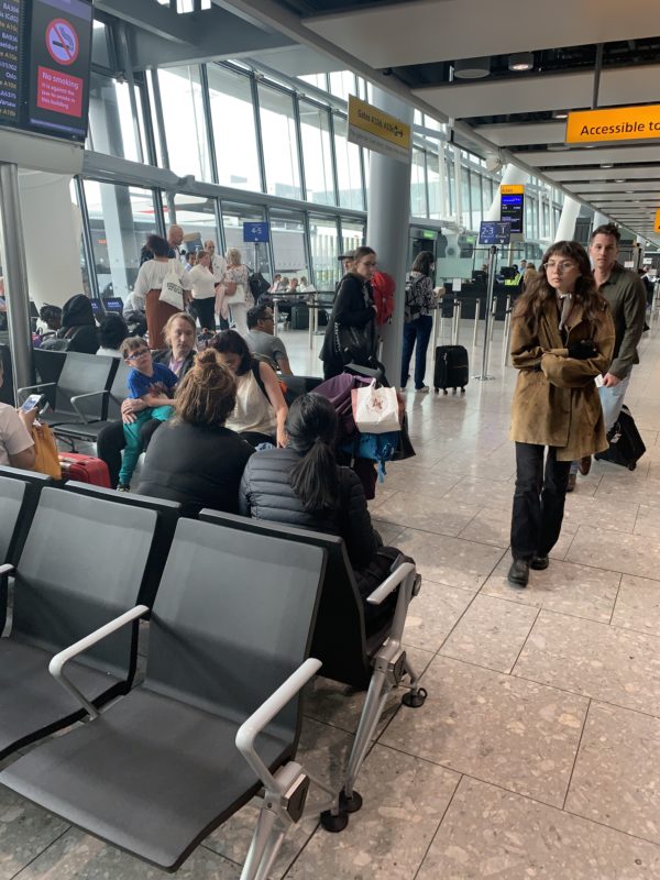 a group of people in an airport