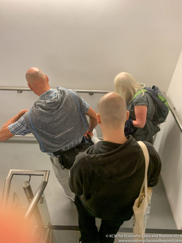 a group of people standing on a staircase