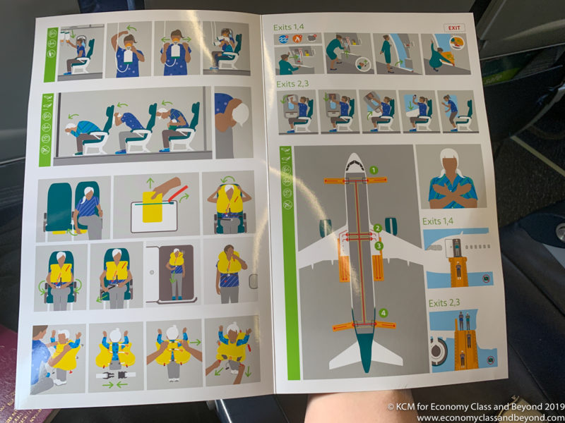 a book with instructions on the front of the plane