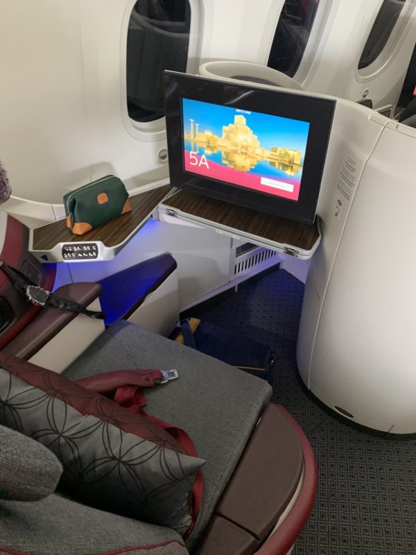a tv on a table in a plane