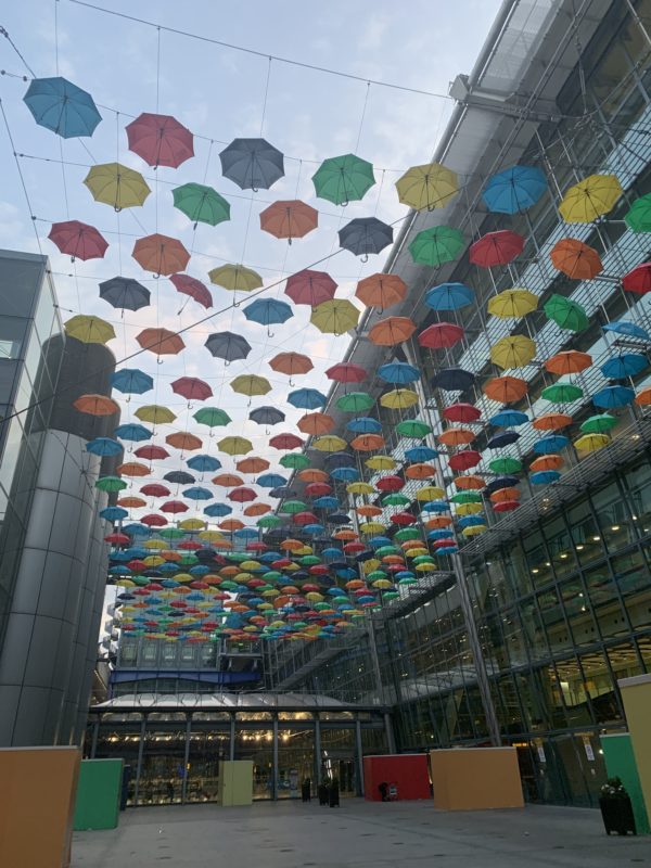 a multicolored umbrellas from the ceiling