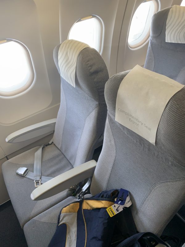 a pair of seats in an airplane