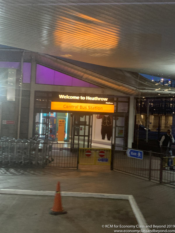 a sign at a bus station