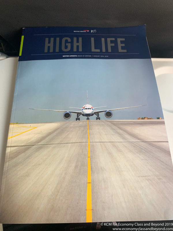 a magazine with a plane on the runway