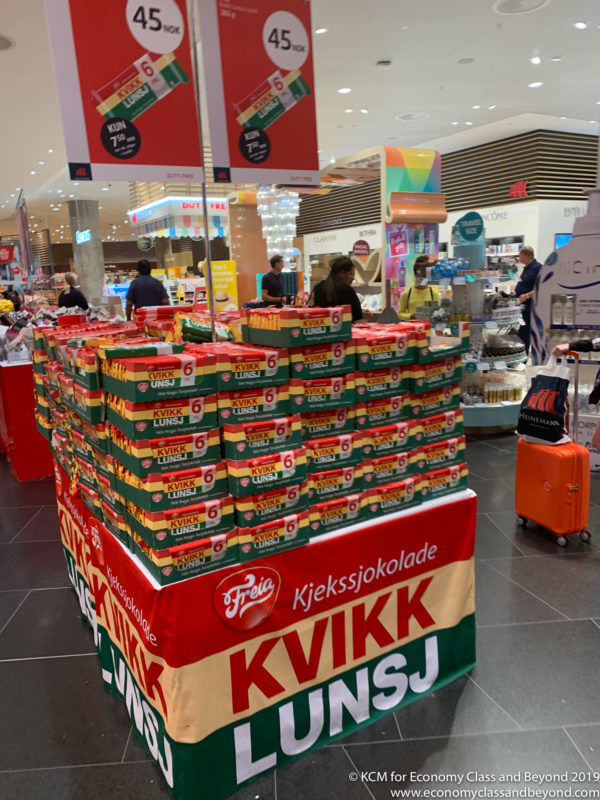 a large stack of food items in a store