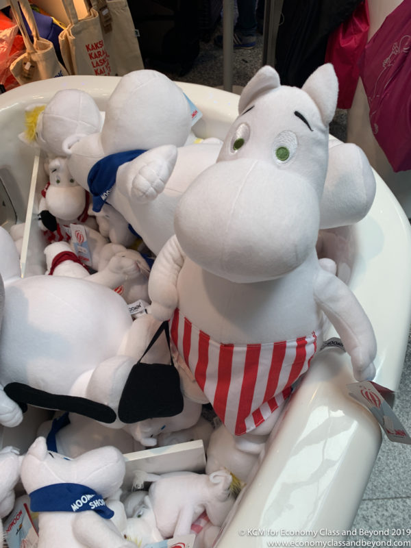 a group of stuffed animals in a tub