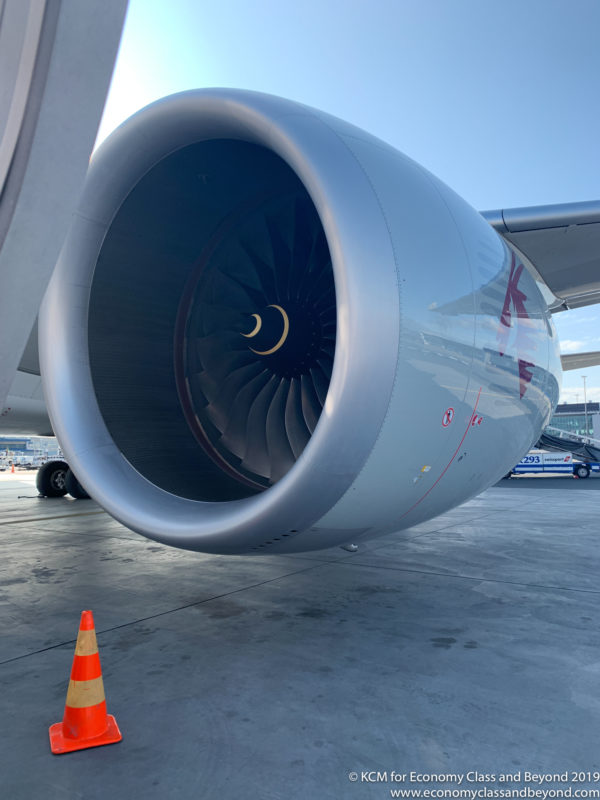 a large jet engine on a tarmac