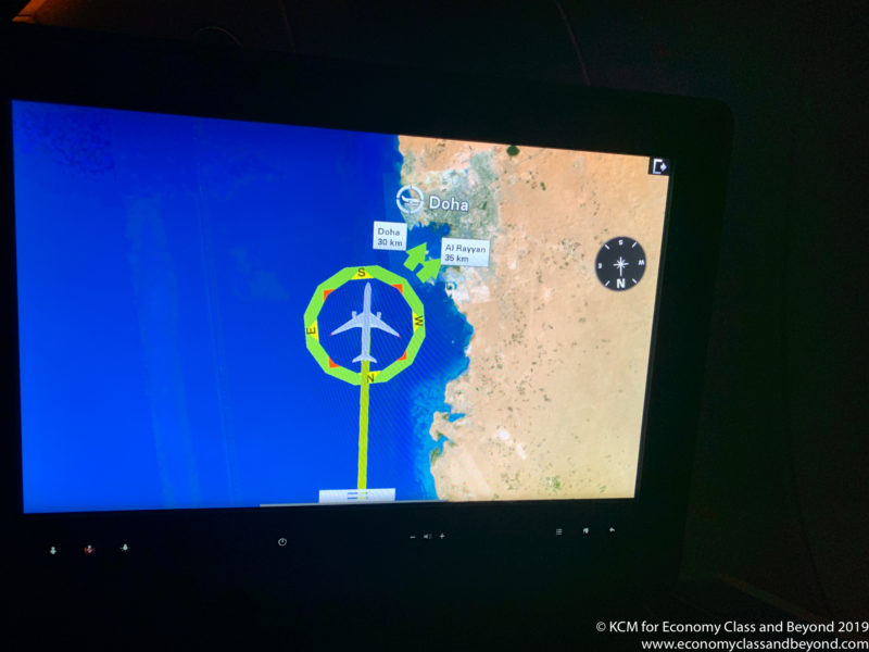 a computer screen with a map and a plane on it