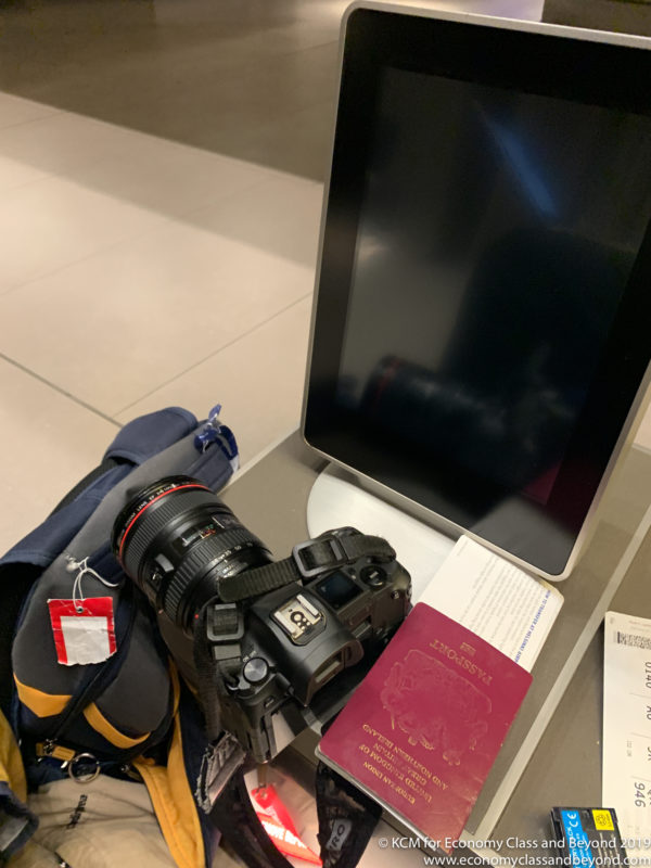 a camera and a tablet on a table