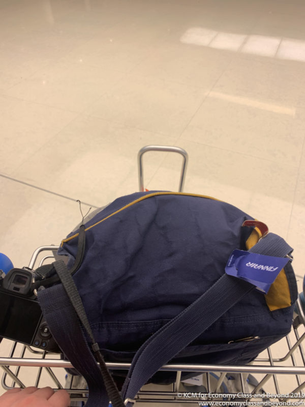 a bag on a shopping cart
