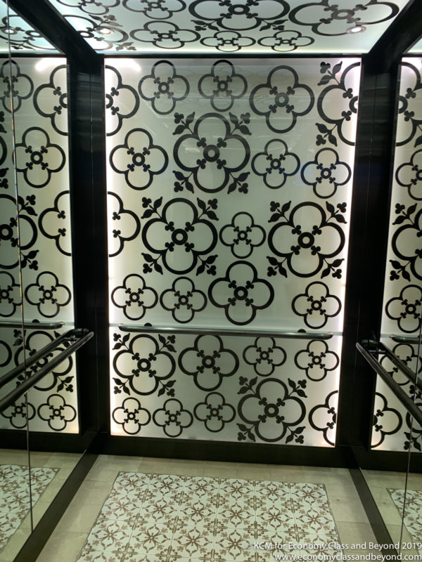 a glass doors with black and white designs