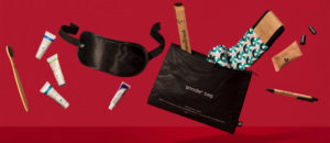 a black bag with a mask and a tube of toothpaste