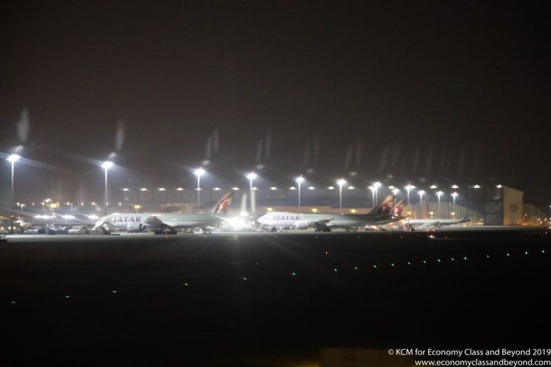 airplanes on the runway at night