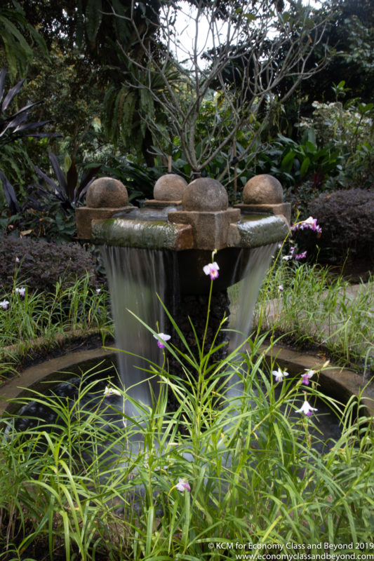 a fountain with water flowing over it