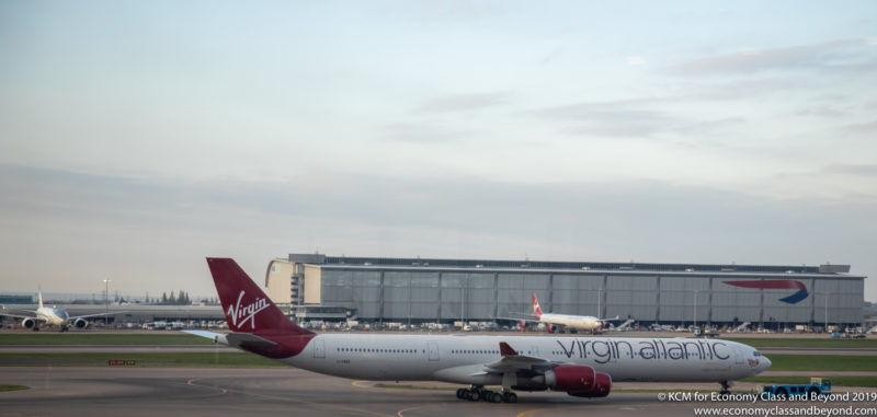 Virgin Atlantic Airbus A340-600 on tow - image, economy class and beyond