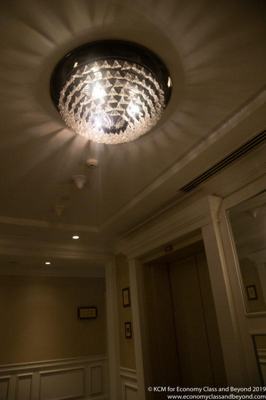 a chandelier on a ceiling