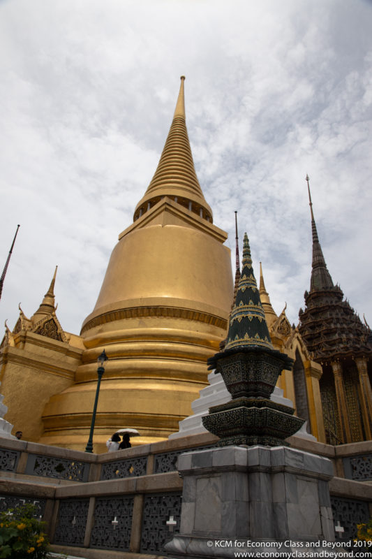 a large gold pagoda with pointed top