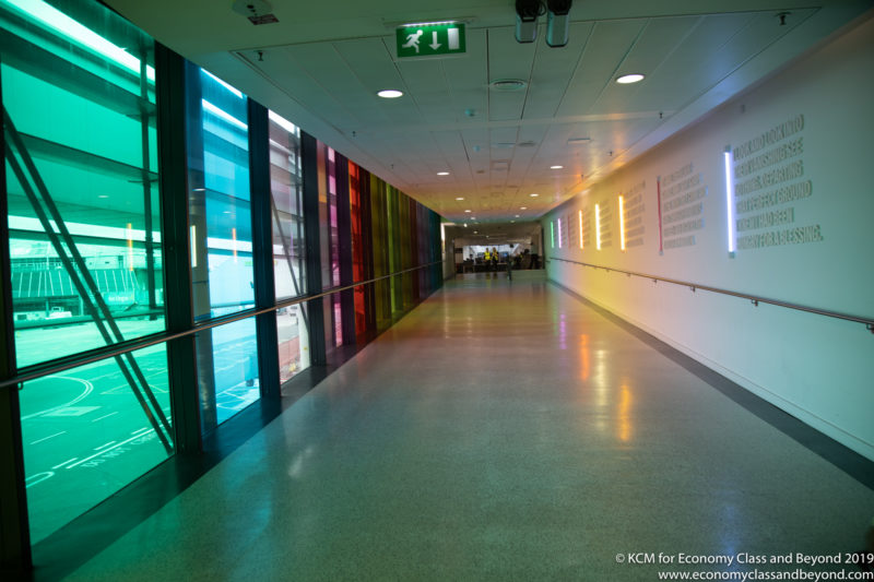 a long hallway with colorful walls