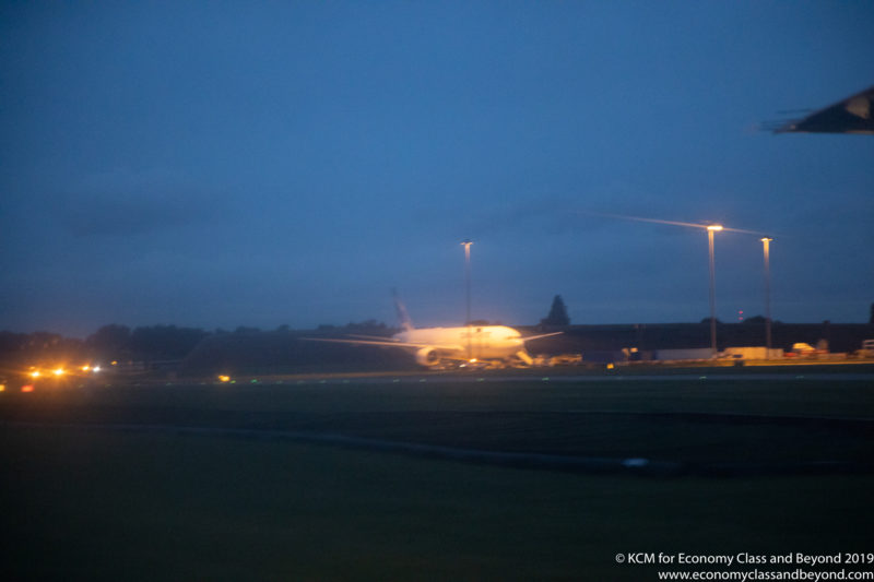 an airplane on a runway at night