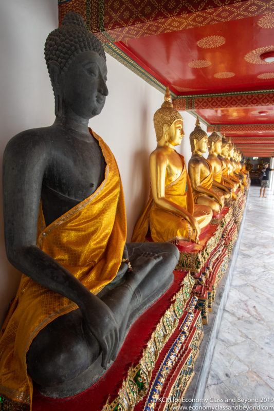 a row of statues in a row