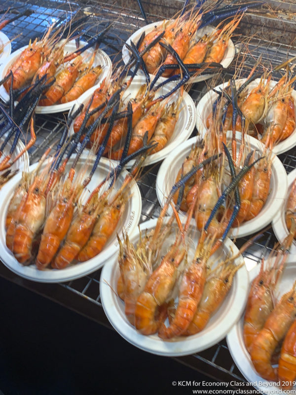 a group of shrimp on plates