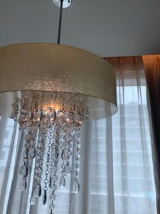 a chandelier with crystals from the ceiling