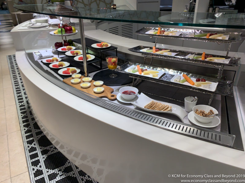 a buffet with different food on plates