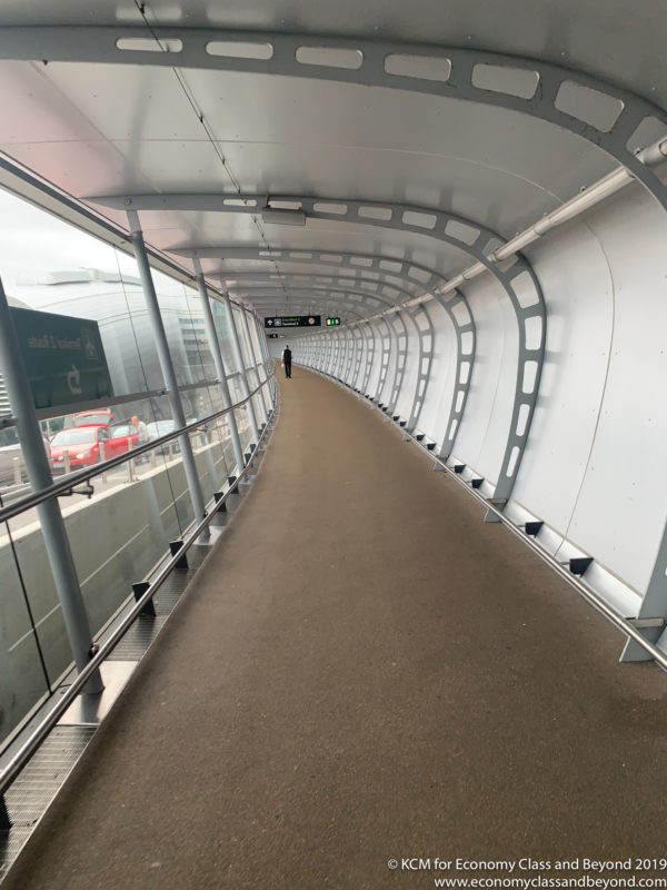 a person walking on a walkway