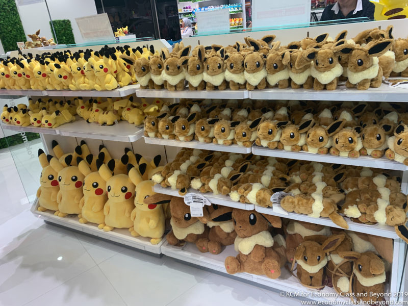 a shelf with stuffed animals