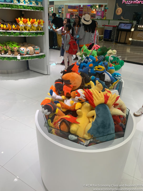 a group of stuffed animals in a store
