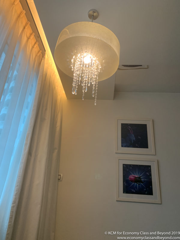 a light fixture with crystals from the ceiling