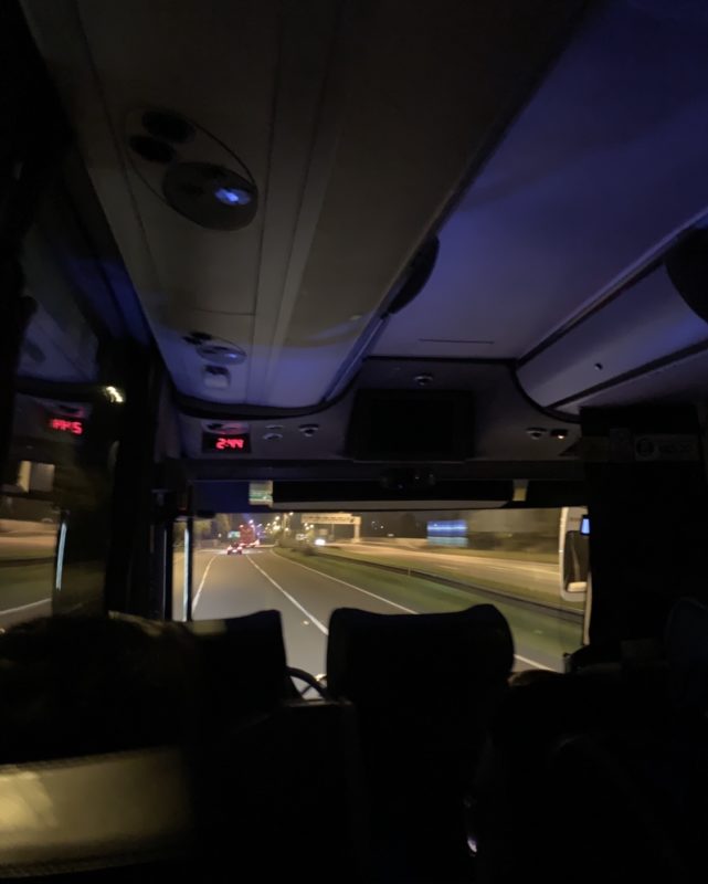 inside a bus at night