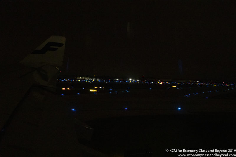 a plane wing at night