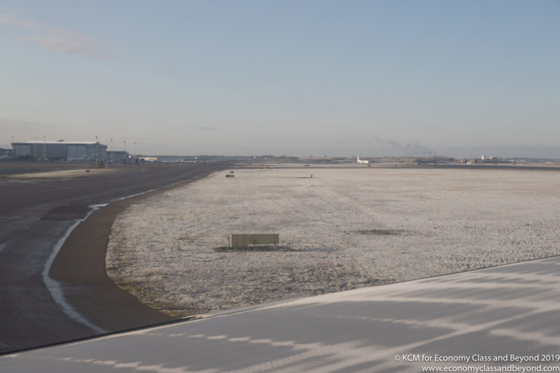 a runway with snow on the ground