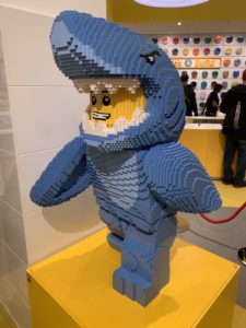 a blue shark made out of lego blocks