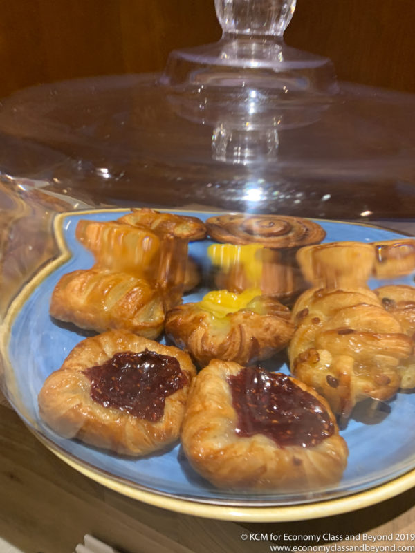 a plate of pastries with jam on it