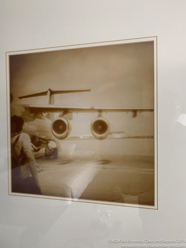 a framed picture of a plane