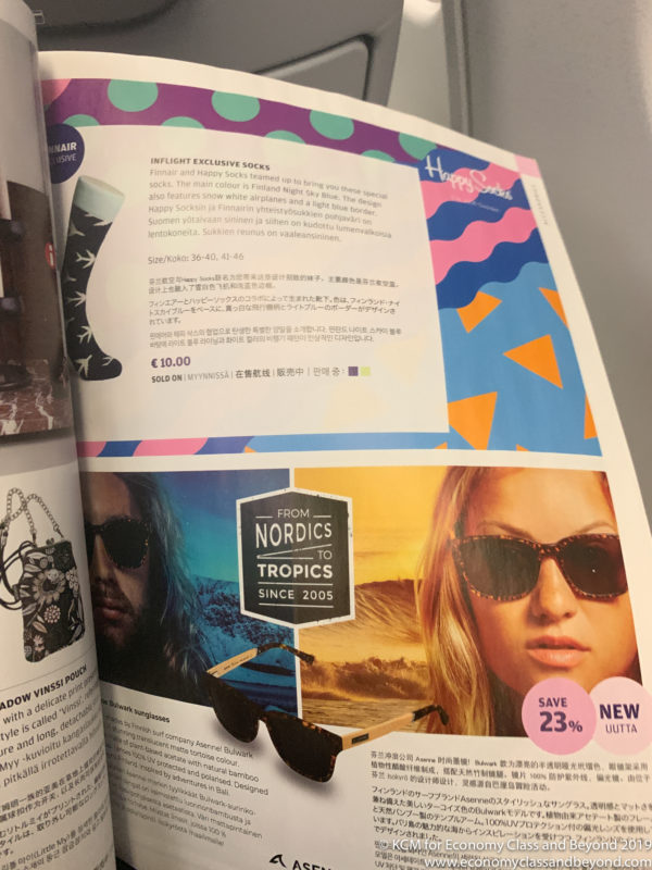 a magazine with a picture of a woman wearing sunglasses