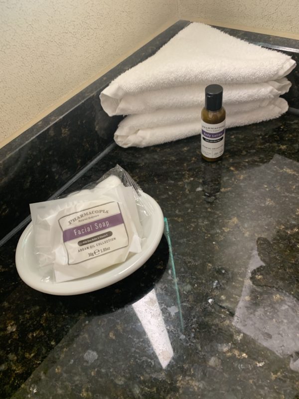 a soap and a bottle on a counter