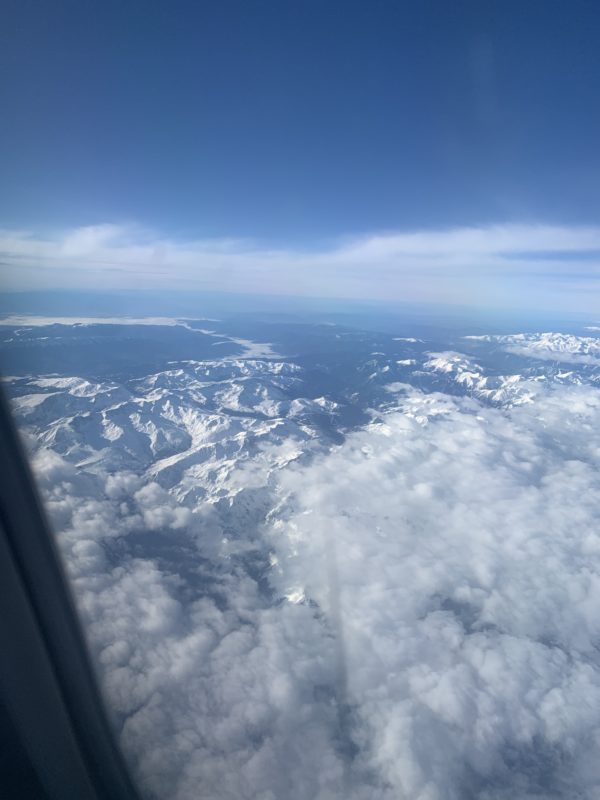 a view of the mountains from an airplane window