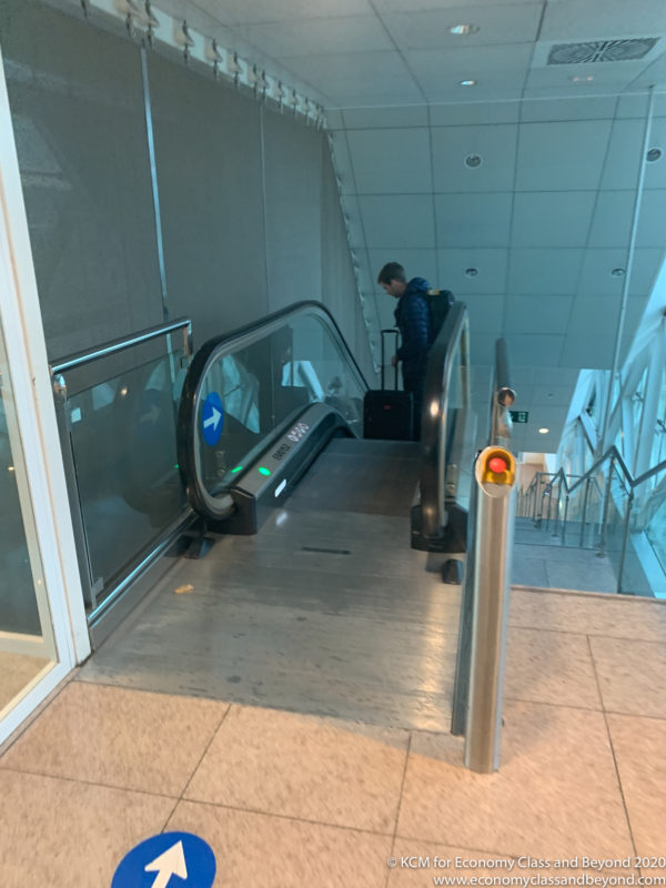 a person on an escalator