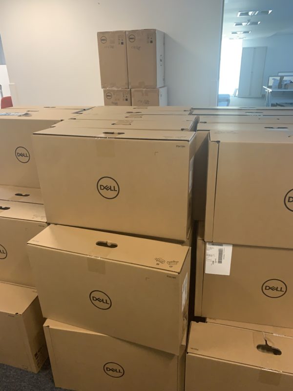 a group of boxes stacked in a room
