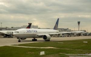 United Airlines Boeing 777-200ER preparing to depart London Heathrow - Image, Economy Class and Beyond