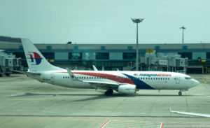 Malaysia Airlines Boeing 737-800 preparing to depart Singpaore Changi Airport - Image, Economy Class and Beyond