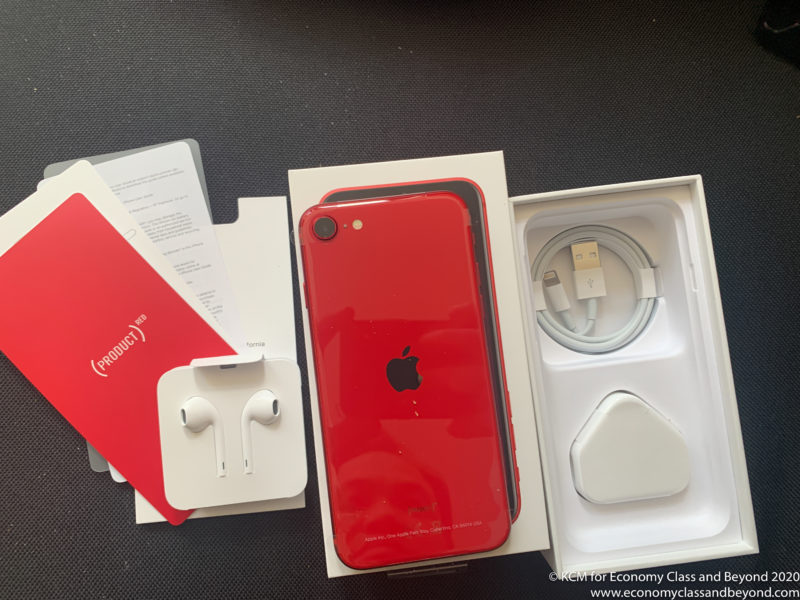 a red cell phone in a box