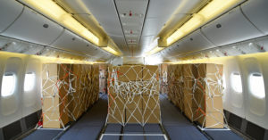 boxes wrapped in ropes on a plane