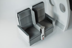 a grey and white airplane seats