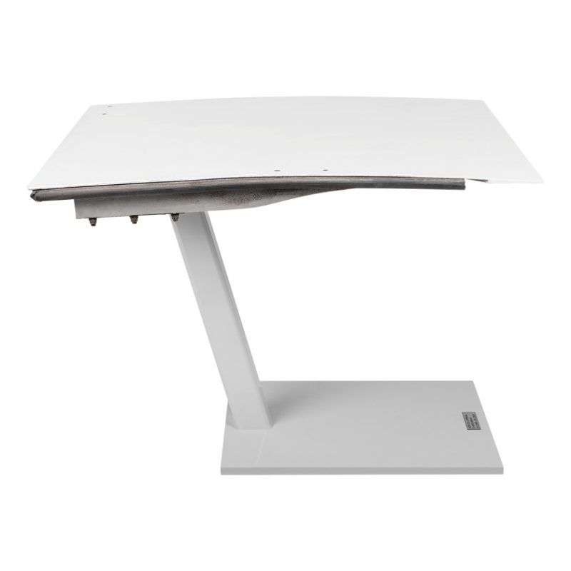 a white table with a broken top
